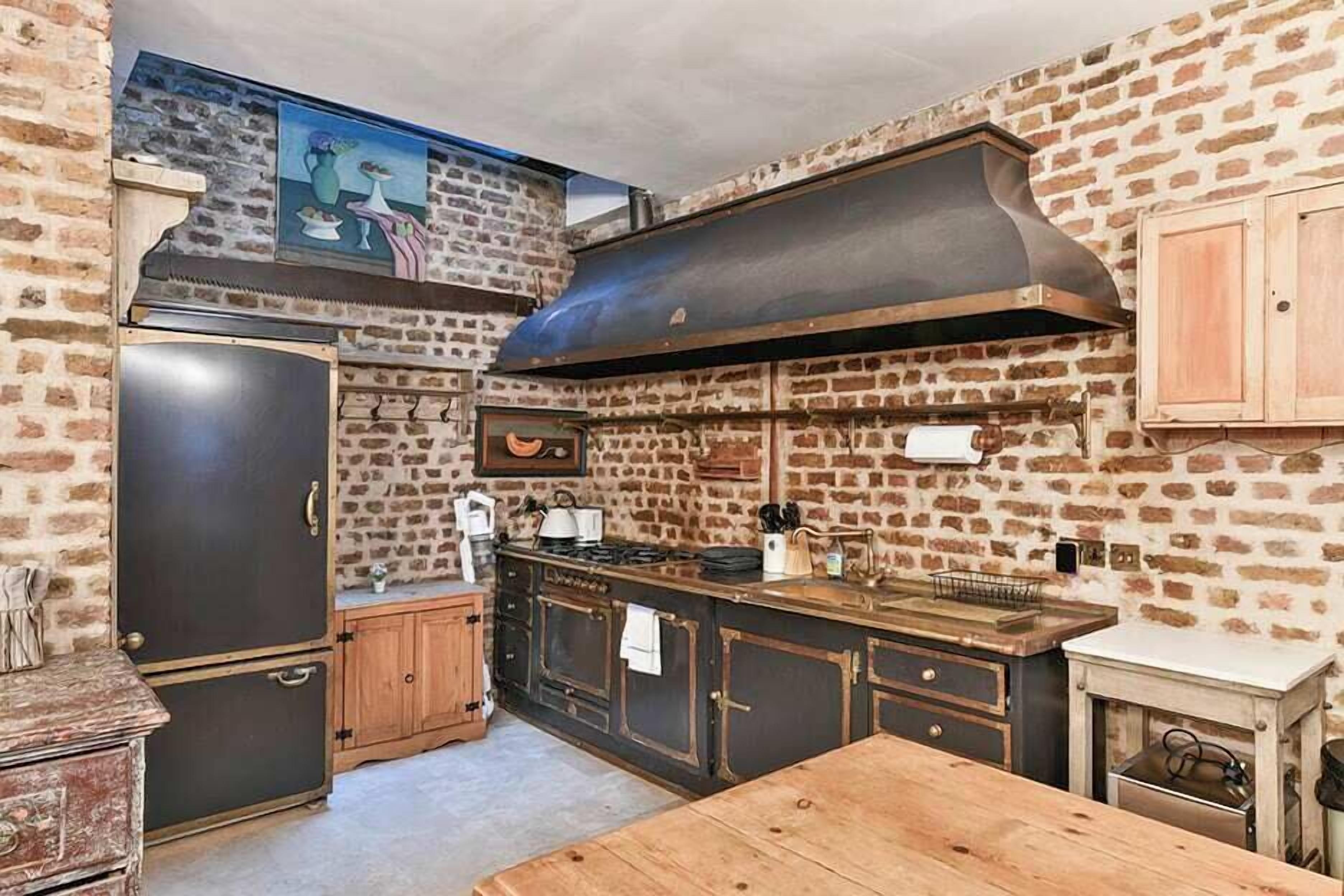 Fridge, stovetop, dishwasher, coffee/tea maker