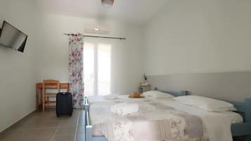 Een strijkplank/strijkijzer, wifi, beddengoed