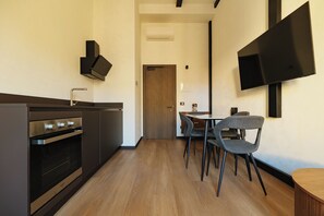 Deluxe Condo | Living area | TV - Cavour Suites (Ancona)