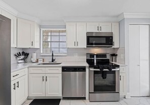 Fridge, oven, stovetop, dishwasher - The Mandarin Pool Place | Pool + Games (Jacksonville)