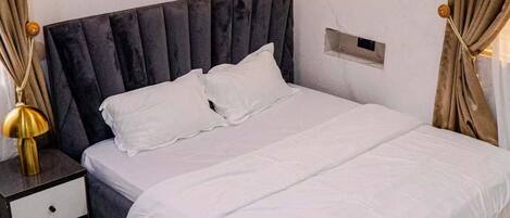 Desk, laptop workspace, blackout curtains, soundproofing