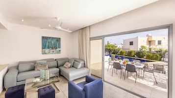 Superior Townhome | Living area | 50-inch Smart TV with cable channels
