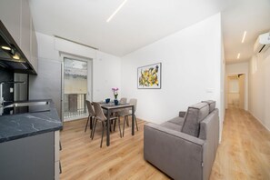 Living area - GuestHost - Cozy 69 sqm apartment, located on the first floor of a building without an elevator.The accommodation is situated in a strategic location, allowing you to reach the main points of interest within a short walking distance or by public transpor (Udine)