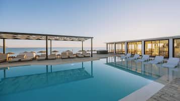 Seasonal outdoor pool, sun loungers