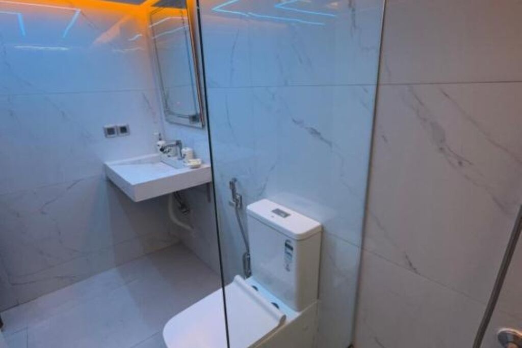 Shower, towels, toilet paper