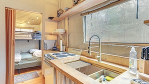 A compact kitchen with a wooden countertop, a sink, and a window above the sink. - Hikers Hideaway w/ Hot Tub Near Lookout Mountain (Trenton)