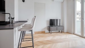 Lägenhet - 1 dubbelsäng med bäddsoffa - balkong | Vardagsrum | 32-tums smart-tv med kabelkanaler