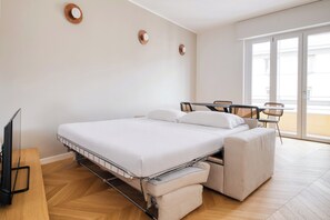 Apartment, 2 Bedrooms, Balcony | Living area | 32-inch Smart TV with cable channels - Modern Flats with Balconies in Loreto (Milan)