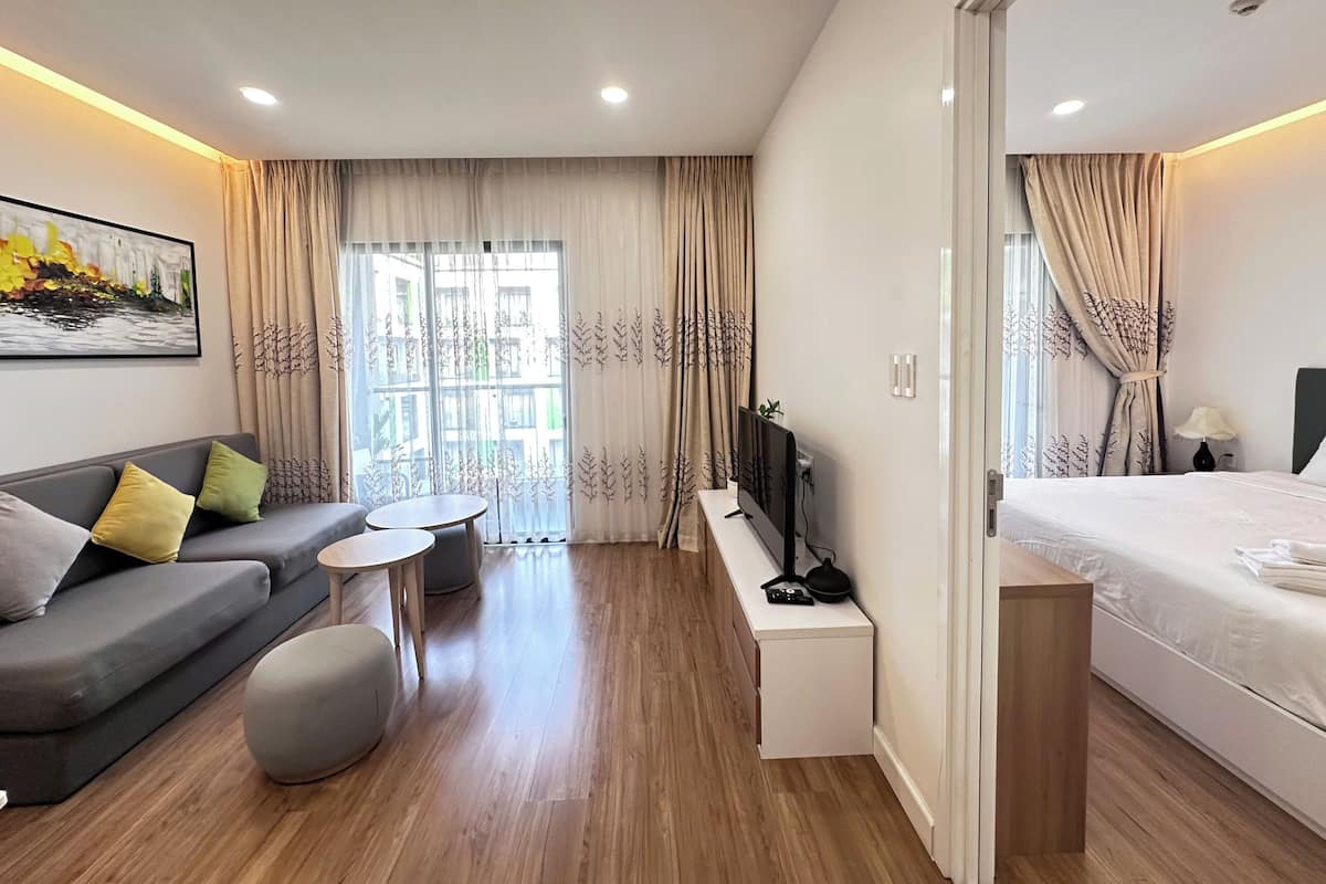 Luxury Apartment, 1 Bedroom, Kitchen, Pool View | Living area | 55-inch Smart TV with digital channels