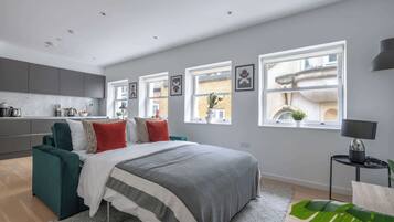 1 bedroom, desk, iron/ironing board, travel crib