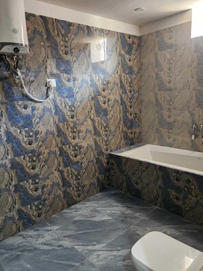 Deluxe Double Room, City View | Bathroom | Shower, free toiletries, towels, soap - Shri Prem Sharnam (Vrindavan)