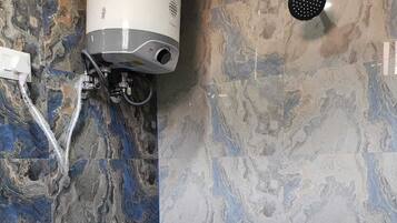 Deluxe Double Room, City View | Bathroom | Shower, free toiletries, towels, soap