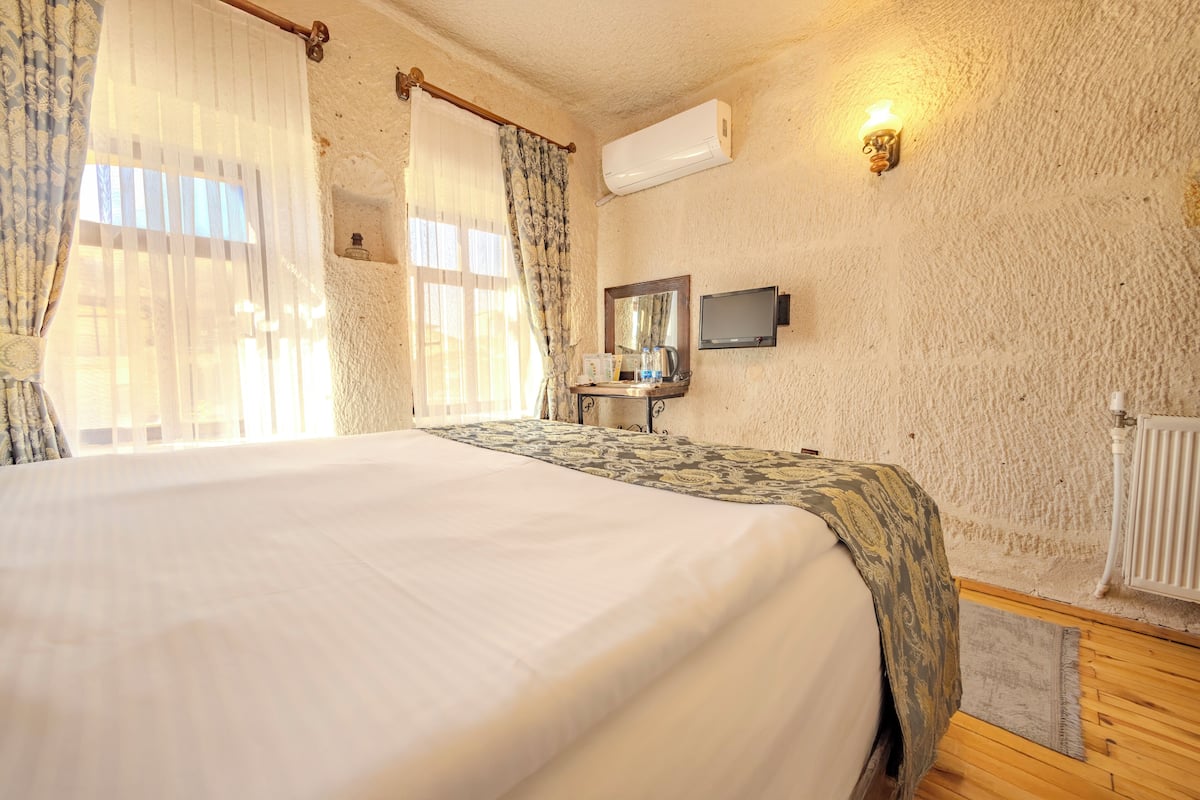 Deluxe Double Room, Resort View | In-room safe, desk, laptop workspace, soundproofing