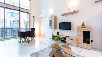 Standard Apartment | Living area | Flat-screen TV