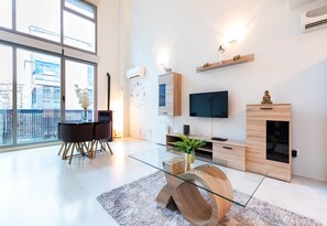 Standard-Apartment | Wohnbereich | Flachbildfernseher