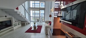 Standard-Apartment | Wohnbereich | Flachbildfernseher