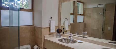 Shower, hair dryer, towels, soap