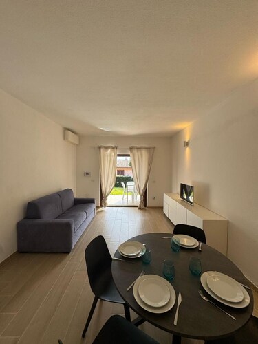 Apartment 'Porto San Paolo Nature' with Terrace, Private Garden and Air Conditioning