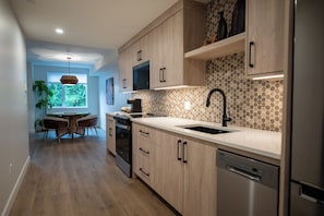 Fridge, microwave, oven, stovetop - Tropical Suite 203 - The Agora a Boutique Hotel (Qualicum Beach)