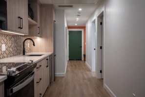 Fridge, microwave, oven, stovetop - Tropical Suite 203 - The Agora a Boutique Hotel (Qualicum Beach)