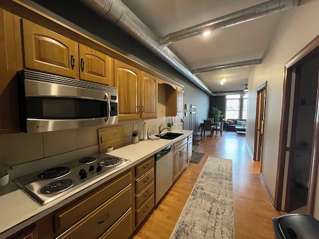 Fridge, microwave, stovetop, dishwasher. Downtown 2-bedroom luxury apartment in Wooster