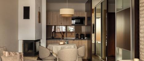 Deluxe Apartment, Balcony | Living area | Flat-screen TV