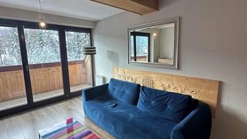 Deluxe Apartment, Balcony | Living area