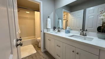 Hair dryer, towels, soap, toilet paper