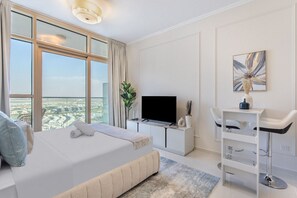 Iron/ironing board, free WiFi, bed sheets - Cozy Studio in Carson  A, Damac Hills (Dubai)