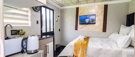 Fer et planche Ă repasser, accĂšs Ă Internet, literie fournie