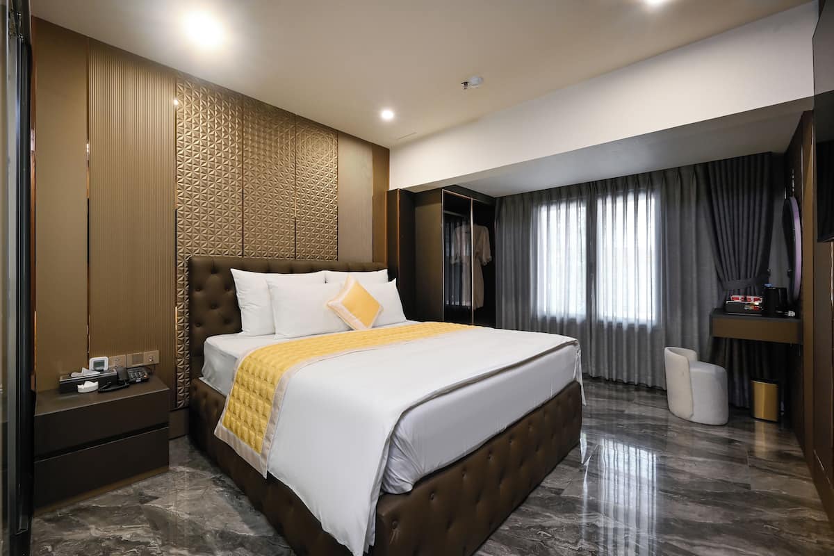 Minibar, coffres-forts dans les chambres, rideaux occultants