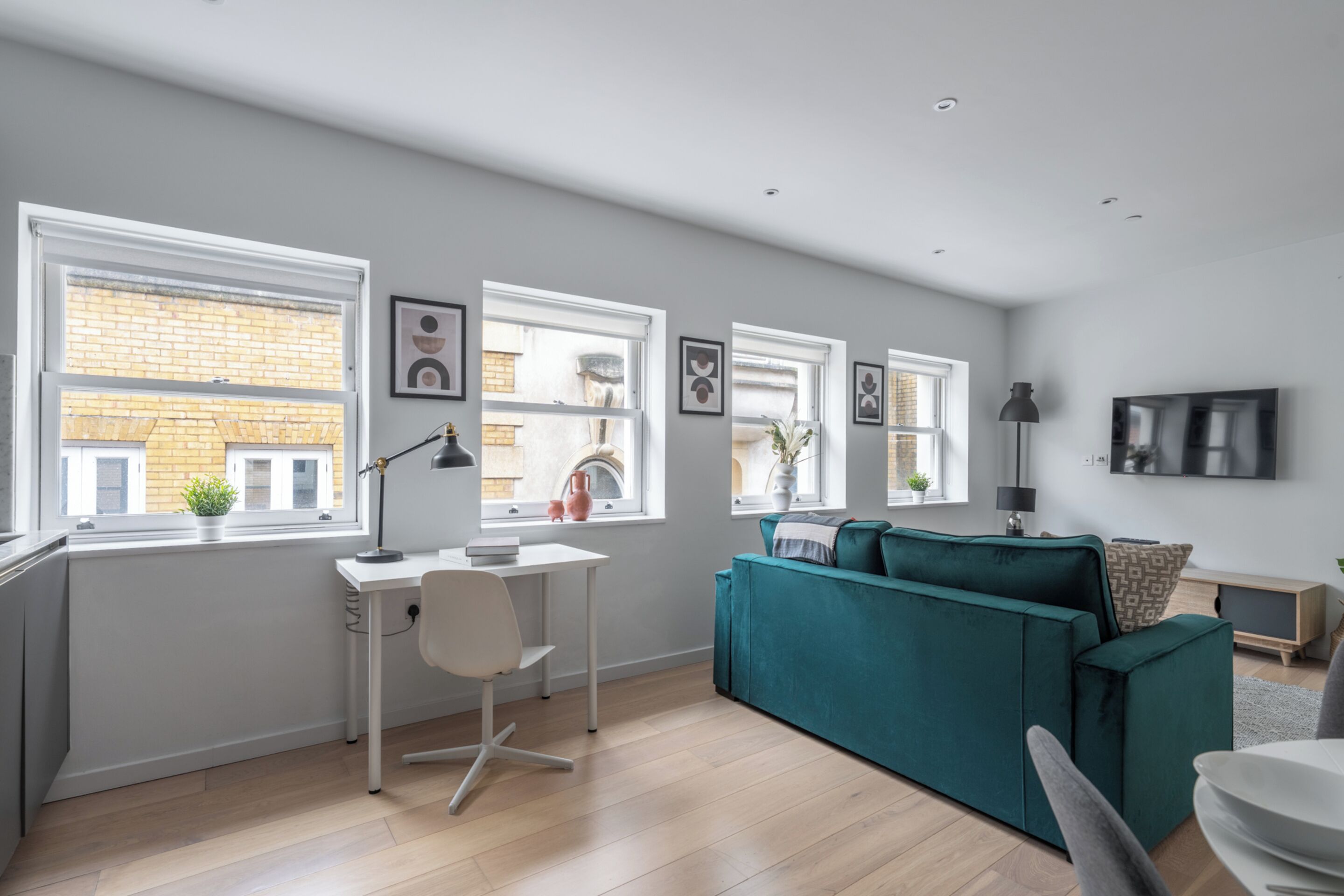 City-lejlighed - 1 dobbeltseng med sovesofa - ikke-ryger - byudsigt | Opholdsområde | 40-tommers smart-tv med satellitkanaler