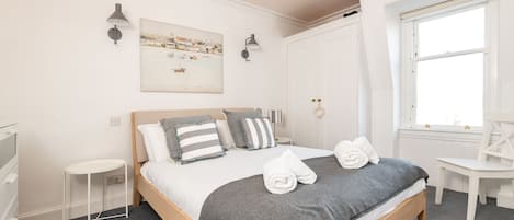 2 habitaciones, tabla de planchar con plancha y wifi gratis