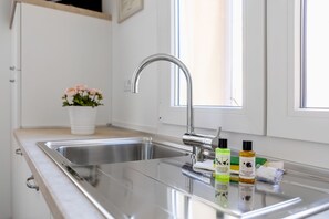 Studio, City View | Private kitchen - Palazzo Pedretti by Halldis (Bologna)