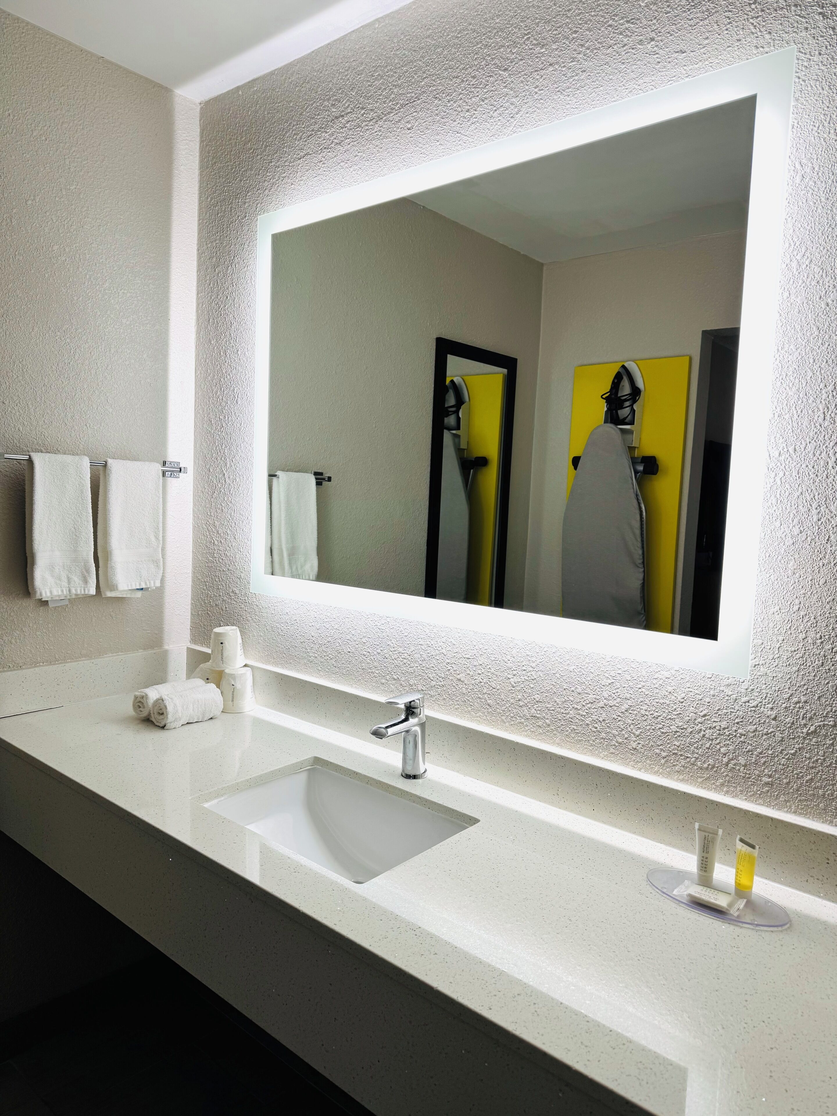 Hair dryer, towels, soap, toilet paper