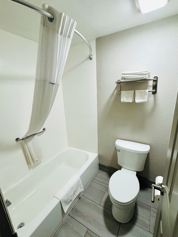 Hair dryer, towels, soap, toilet paper