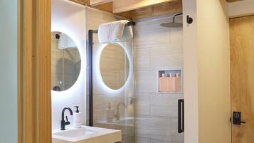 Shower, eco-friendly toiletries, hair dryer, towels