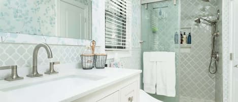 Shower, hair dryer, towels