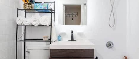 Shower, hair dryer, towels