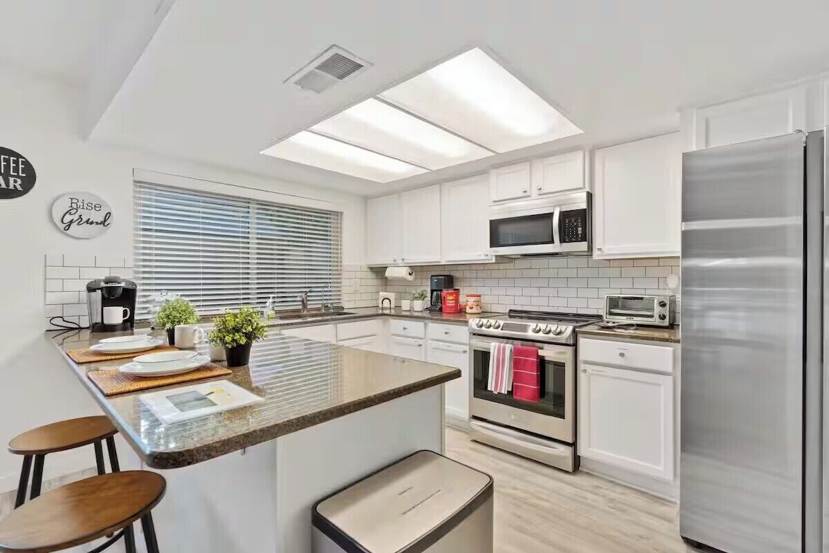 Comfort Quadruple Room | Private kitchen | Fridge, microwave, oven, stovetop