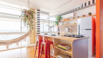 Fridge, microwave, oven, cookware/dishes/utensils