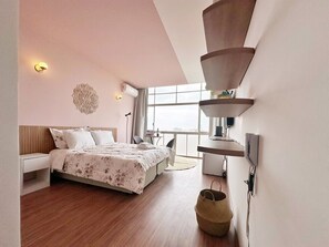 A modern bedroom with a bed, bedside table, and a large window. - 2406B (São Paulo)