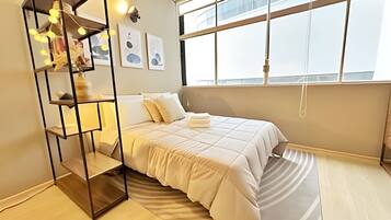 Ferros/tábuas de passar roupa, acesso à internet, roupa de cama