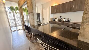 Fridge, microwave, oven, cookware/dishes/utensils