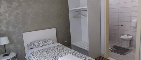 Chambre Simple Économique | Chambres insonorisées, Wi-Fi gratuit