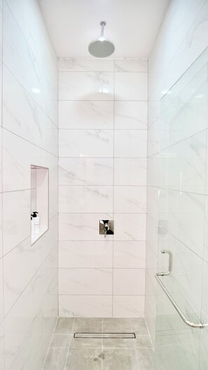 Shower, towels, soap, toilet paper