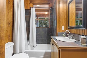 Eco-friendly toiletries, hair dryer, towels, toilet paper