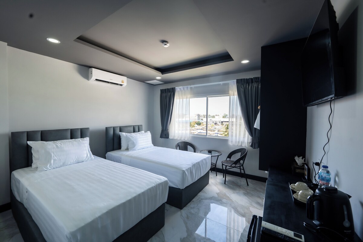 Camera Deluxe con letto matrimoniale o 2 letti singoli, balcone | Una scrivania, postazione laptop, Wi-Fi gratuito