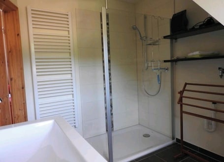 Hair dryer, towels, soap, toilet paper. Sweet Home Suite