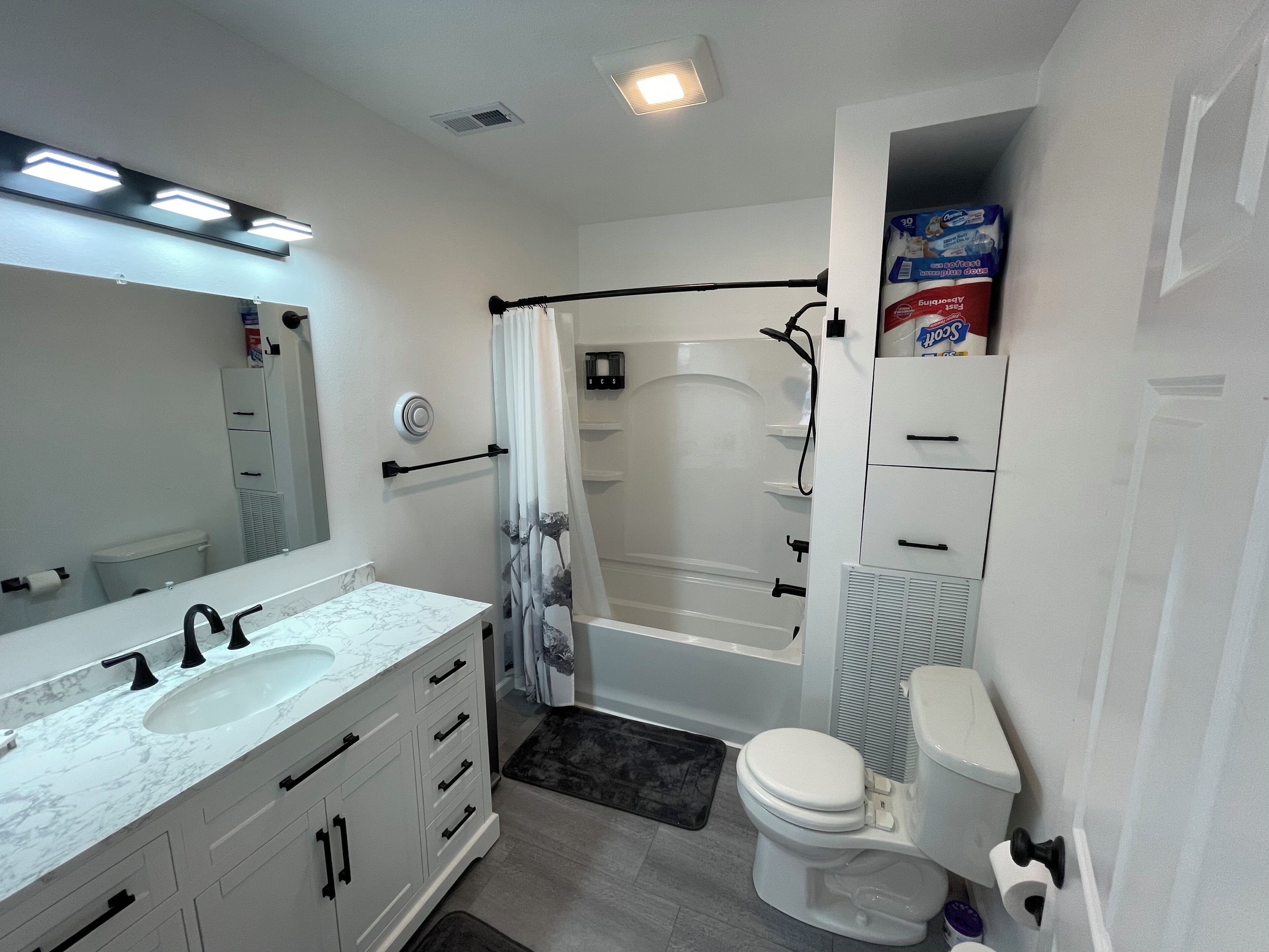 Hair dryer, towels, soap, toilet paper